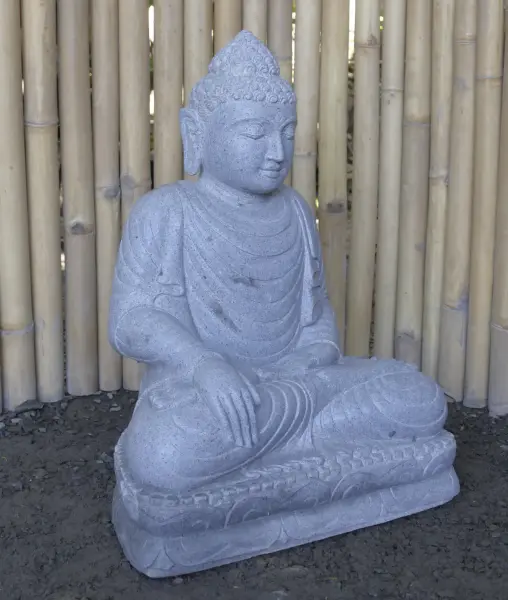 Product image of the product “Seated Buddha made of Riverstone in Bhumisparsha - gesture of touching the earth. 64 cm height. ”